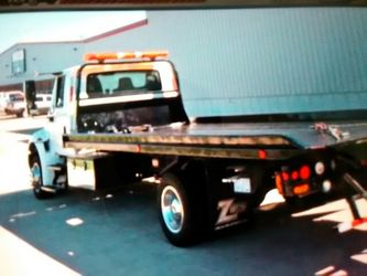 $50 flat rate tow up to 5 miles OR $100 flat rate tow up to 20 miles