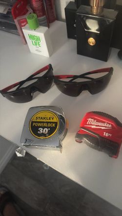 measuring tapes with two safety glasses