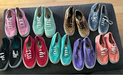 9 pairs of gently used VANS - size 7