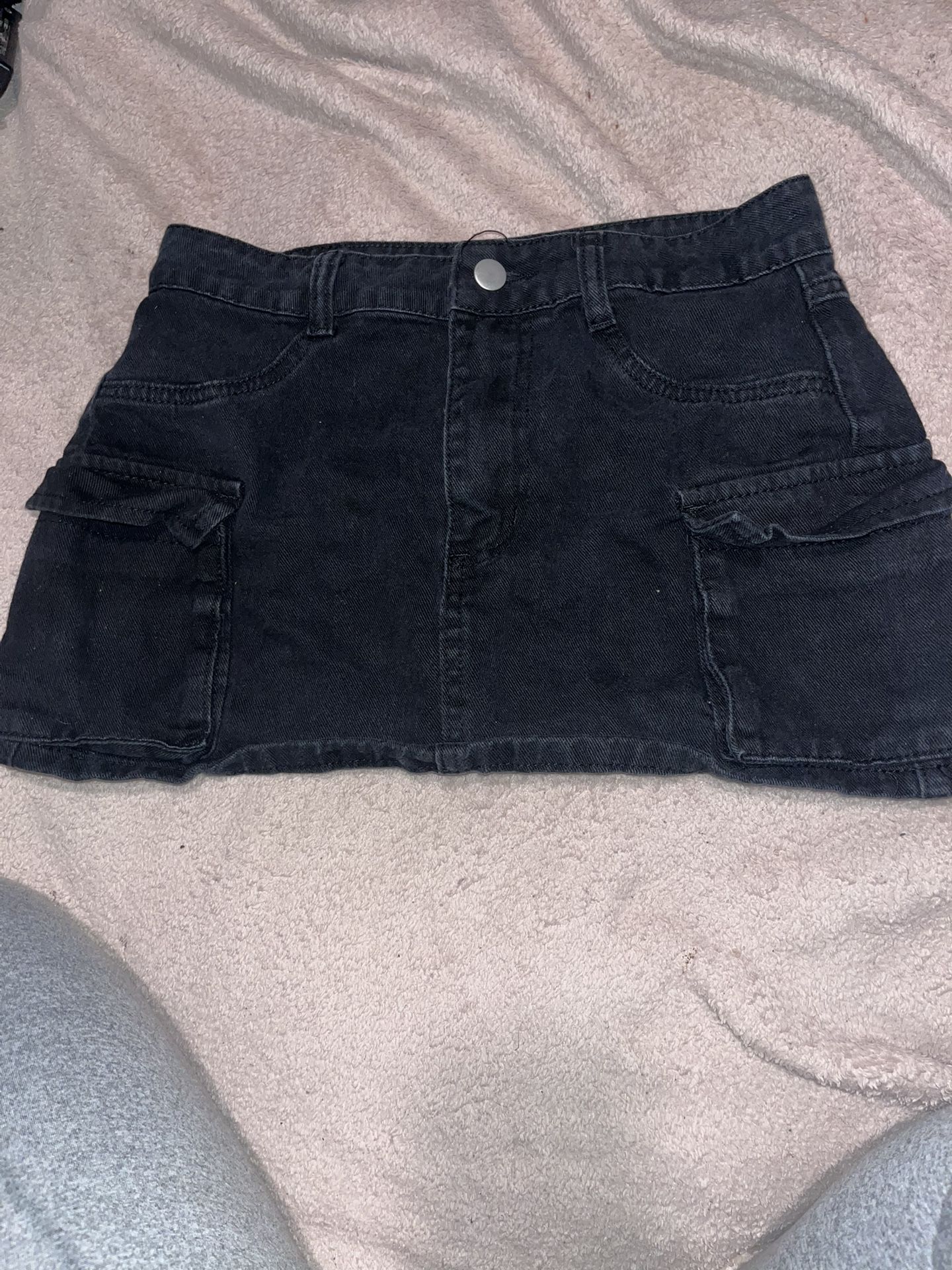 Black denim mini skirt