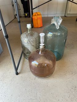 3 home brew carboys. 5 gallon, 3 gallon and 2 gallon
