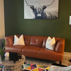 Burn orange leather couch I want 450 excellent condition