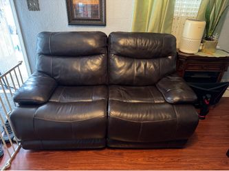 Brown leather double recliner