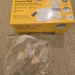 brand new medela pump and style sealed and also extra pump parts