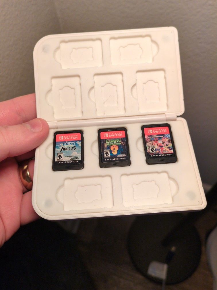 Luigi's Mansion, Pokemon Arceus, Mario Kart 8 Nintendo Switch Games