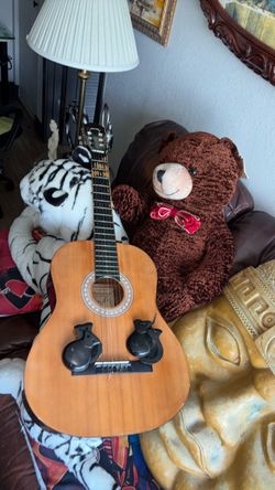 Guitara y  castañuelas  $60