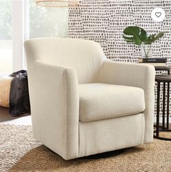 Cream Upholstered Swivel Accent Chair