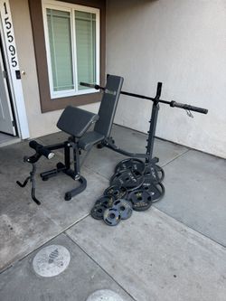 Bench press with 260lbs of Olympic weights and 7ft 3 piece bar