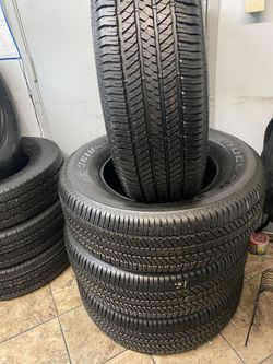 SET 255/70/18 BRIDGESTONE DULER SEMI NEW 95%TREAD LIFE 300 PRICE INCLUDE PROFESSIONAL INSTALLATION AND TAX