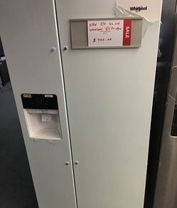 New scratch and dent whirlpool 22 cu ft Sid by side fridge. 1 year warranty