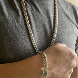 Stainless steel Cuban link set with 14 K stamp