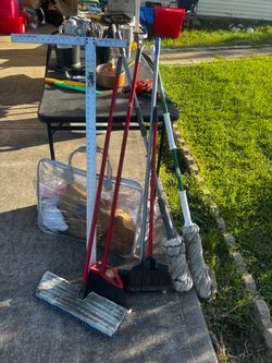 Brooms and mop $1 each