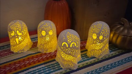 Ghost tea light holders