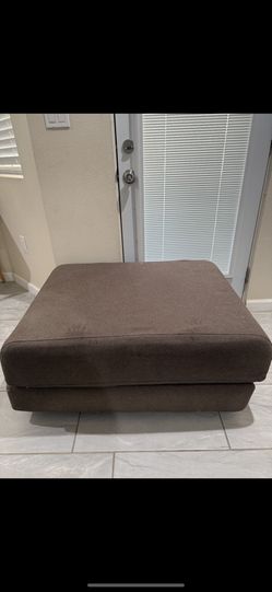 Brown Ottoman turns to Bed