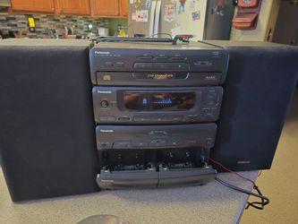 Panasonic SA-CH52 is a vintage 1995 compact shelf stereo system featuring a 3-disc CD changer, dual cassette decks with auto-reverse, and an AM/FM tun