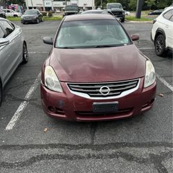 Nissan burgundy red 2012