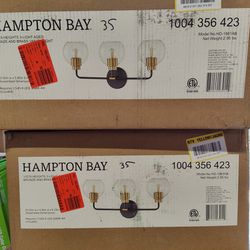 Hampton Bay 3 Light Bathroom Vanity Light Fixture In Aged Bronze And Brass, Few Available 