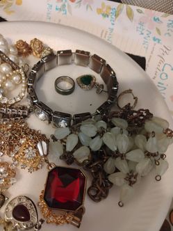 This whole plate of jewelry for one price it was given to me by someone passed away I don't know much about it I'll take $125 for all of it so a lot o