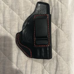 Inside the belt holster fits smaller hand g u n s 
