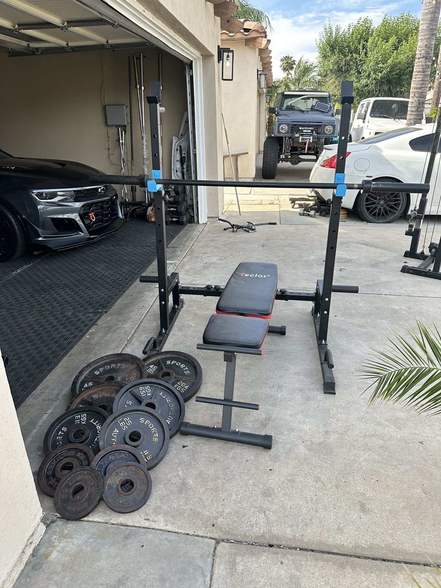 Bench press/squat rack with 6ft bar plus 240lbs of Olympic weights