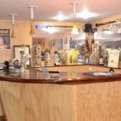 Handmade bar with platform it breaks down to three pieces comes  and everything els