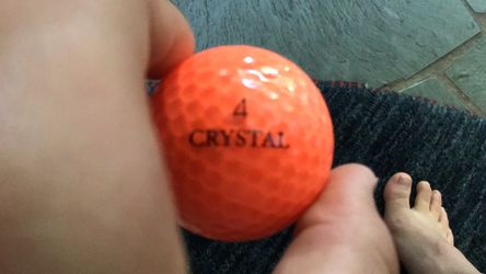 Individual Volvik Crystal orange golf ball