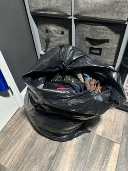 Bag Full of Name Brand Clothes for Men