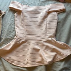 Cute pink baby top, going out top, off the shoulder with flare at the bottom.  Klaxons size small