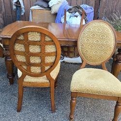 Tommy Bahama Lexington dining table with Lexington French medallion dining chairs