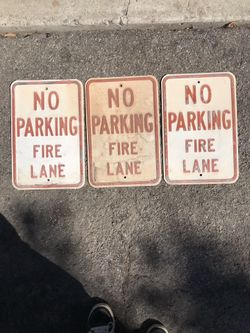 Metal signs no parking...