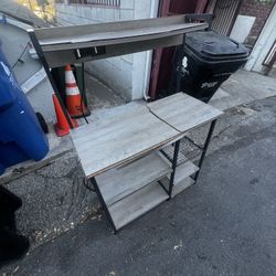 Industrial metal desk / kitchen rack w/ power outlets — needs top repair.