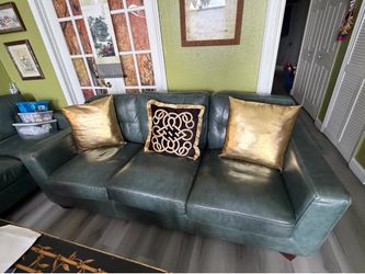 Dark green leather sofa