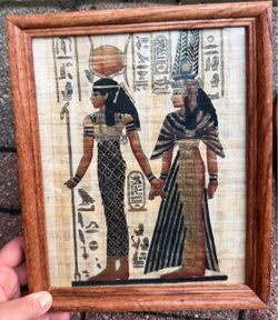 hand-painted Egyptian papyrus art print depicting Queen Nefertari being led by the goddess Isis