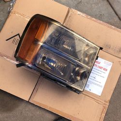 2010 Sierra GMC Passenger Headlight
