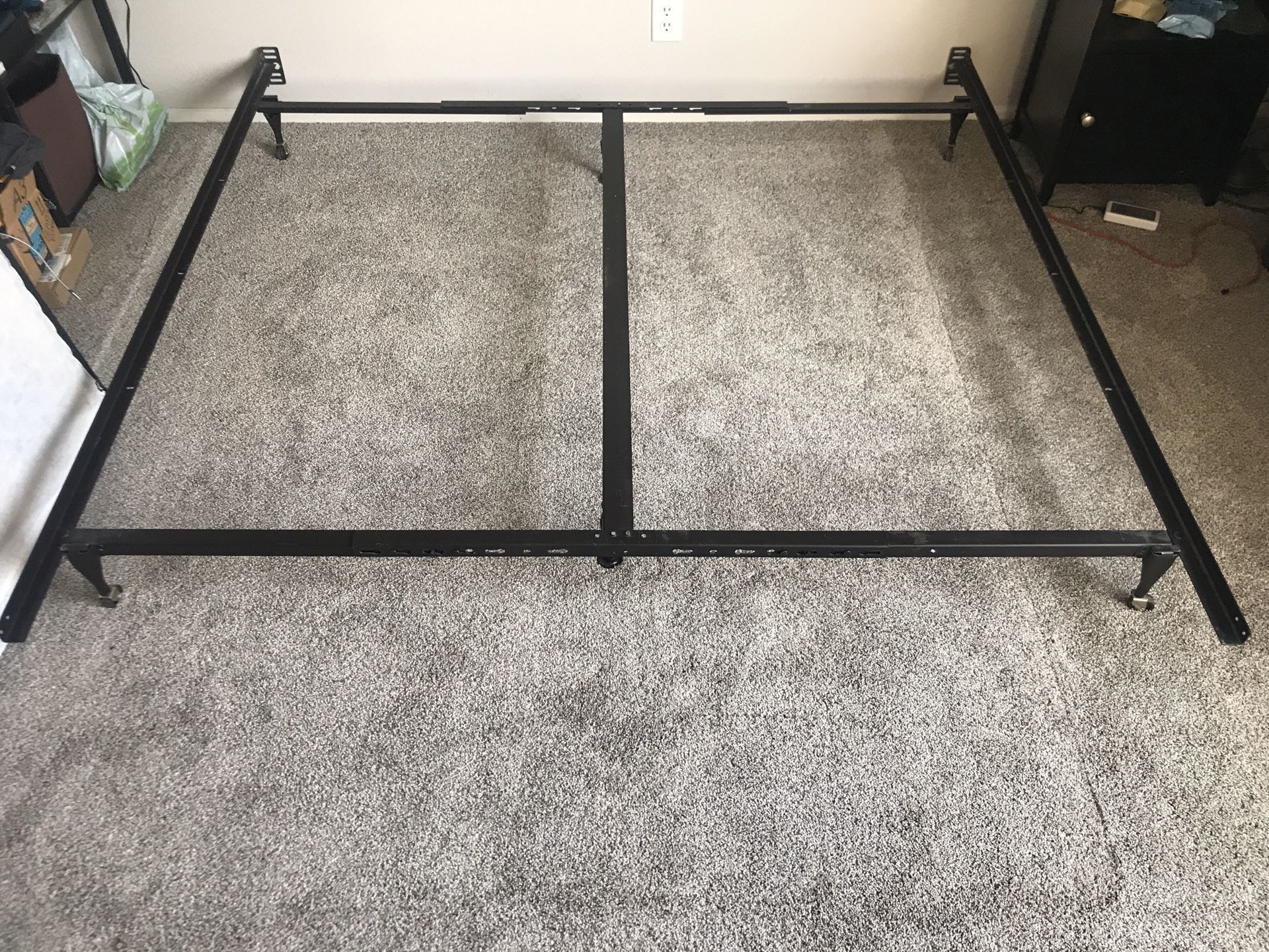 Adjustable king or queen size bed frame
