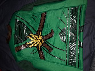 Child’s green ninjago costume