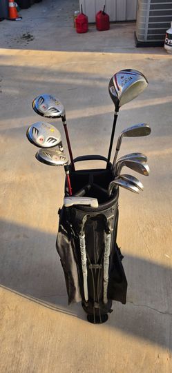 USED GOLF CLUBS WITH BRAND NEW BAG