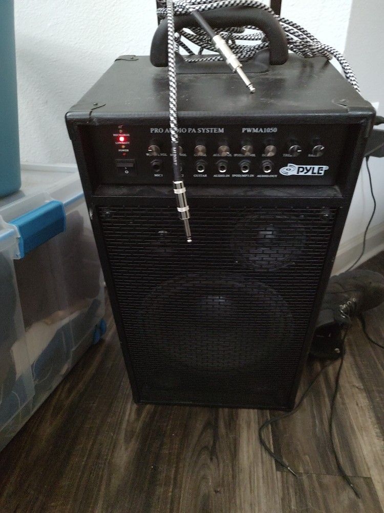Electric Guitar Amplifier And Cable