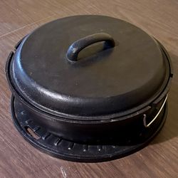ANTIQUE DUTCH OVEN WITH PLATFORM