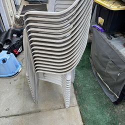 15 light grey plastic chairs, firm $40
