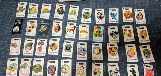Disney pins and tote bag
