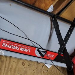 42 inch lawn sweeper like new but needs bagger attachment to catch sweeping 