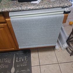 This is a custom cordless window roller shade, 