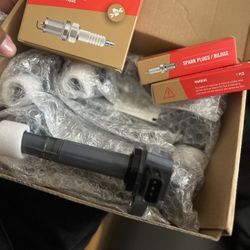 Brand New Spark Plugs & Coil Packs 