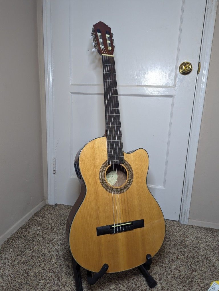 Lucero Model LC-100CE/N Acoustic Electric Guitar.