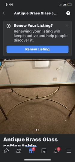 Antique glass coffee table
