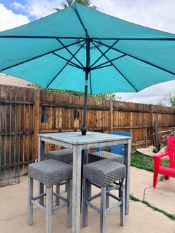 Aluminum patio table with 4 benches and umbrella included