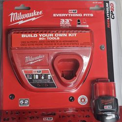Brand new Milwaukee M12 2.0 battery with battery charger