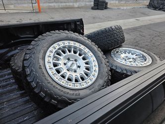 18" KMC rims w/ BfGoodrich KO2 tires