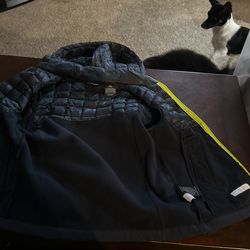 Blue and green zip up jacket